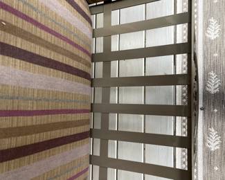 C115 - $225. Wrought Iron Couch with cushions. Measures 74" wide x 31" deep x 33" tall. No name. Solid piece in very good condition. Used on covered, screened in porch.