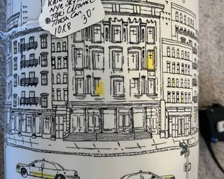 C75 - $30. DKNY NYC Skyline Taxi Ceramic Trash Can. Measures 10" x 8".