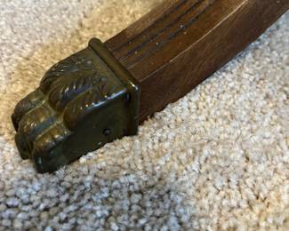 C85 - $85. Round Wooden Side Table with Brass Feet. Measures 20" round x 25.75" tall. Top does have some water rings. Solid wood.
