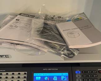 C103 - $300. Brother Color Laser Printer. Model MFC-9970CDW. Measures 19" square x 21" tall. Includes BU-300CL Belt Unit & WT-300CL Waste Toner Cartridge.