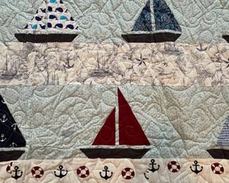 Q5 - $100. Like New Sailboat Quilt. Measures 62" x 97" (twin size)