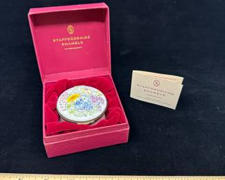 J5 - $50. Crummles & Co Hinged Lidded Trinket Box. Light pink base with floral pattern. Tiny chip in the enamel on the base.