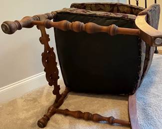 C86 - $250. Single Upholstered Arm Chair. Measures 25" wide x 17" deep x 33" tall. Sturdy with beautifully carved wood frame.