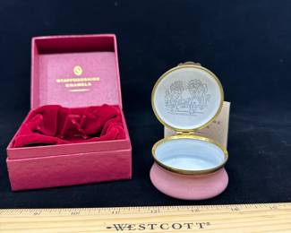 J5 - $50. Crummles & Co Hinged Lidded Trinket Box. Light pink base with floral pattern. Tiny chip in the enamel on the base.