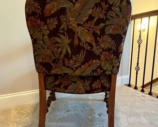 C86 - $250. Single Upholstered Arm Chair. Measures 25" wide x 17" deep x 33" tall. Sturdy with beautifully carved wood frame.