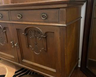 C3 - $1,750. English Renaissance Revival Sideboard. Appraisal dates it to late 19th century. Measures 60" wide x 22.5" deep x 77" tall. Loose fretwork on both sides and missing minor trim pieces. Sturdy and GORGEOUS! Homeowner shipped it back from England in the 90s.