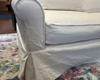 C55 - $1,200. Crate & Barrel Slip Covered Sofa. Measures 78.5" wide x 17.5" floor to seat x 30" deep. (Slipcover was just washed so excuse the wrinkles!) Includes an extra set of slip covers. Very comfortable and in very good condition. Non smoking home - No pets.