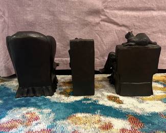 C128 - $75. Set of 3 Chocolate Resin Bookends by Manik. Dog has a tiny chip on the nose - no other issues noted.