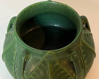 C38 - $150. Ephraim Pottery "Fiddlehead Vase" by Laura Klein. Measures 5" wide x 3" tall.