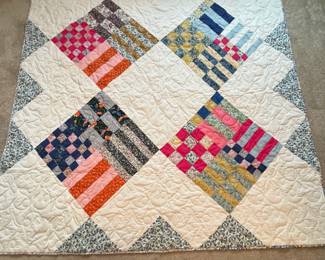 Q4 - $100. Like New Lap Quilt. Measures 80" x 82".
