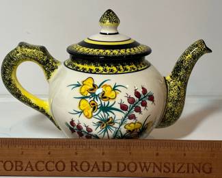 C31 - $200. "Broom & Heather" Quimper. 2 - Dessert Plates 8.5". 2 - Saucers 6". 2 Tea Cups - 5" x 2.25". 1 Cream & Sugar. 1 Tea Pot 8.5" x 5.5".