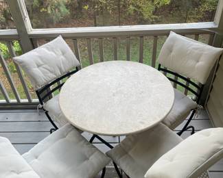 C120 - $350. Wrought Iron Chairs & Table Base. Cushions could use a wash but overall very good condition. Table is 32" round x 29" tall. 4 Chairs are 18" wide x 18" deep x 36" tall. Stone Top is Removable from table for transport. Beautiful heavy set.