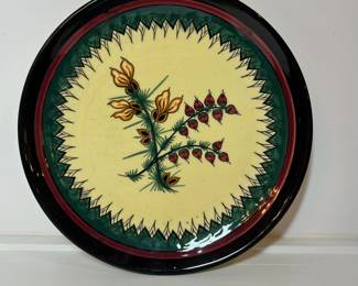 C32 - $30. Single Quimper Plate. Measures 9 1/8". Has 1 small chip on the back and crazing on entire plate.