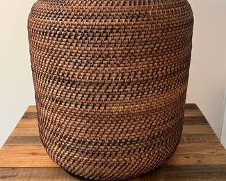 C83 - $30. Woven Floor Basket. Would work as hamper for single person. Measures 14" wide x 17.5" tall.