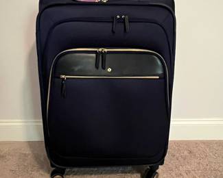 C99 - $40. Samsonite Spinner Wheel Luggage. Measures 17.5" wide x 11" deep x 28" tall.