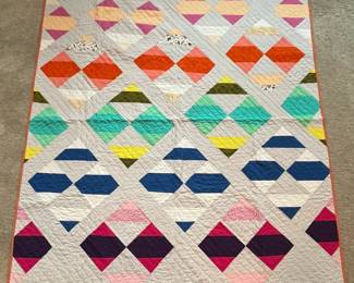 Q12 - $100. Like New Quilt. Measures 55" x 61" (throw / lap size)