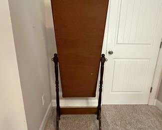 C90 - $350. American Eastlake Cheval Dressing Mirror - circa 1920s. Measures 25" wide x 19" deep x 60" tall. Carved flowers on top and bottom of frame. In very good antique condition.