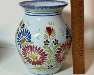 C15 - $50. Quimper Vase Breton Man on one side - floral design on the other. Signed "Henriot Quimper France D 201 F 637 P." Measures 5.75" x 8.5".