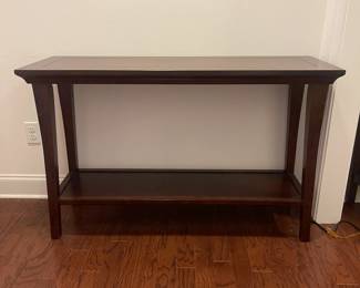 C127 - $65. Sofa Table. Measures 48" x 16" deep x 30" tall.