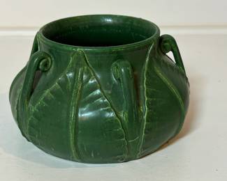 C38 - $150. Ephraim Pottery "Fiddlehead Vase" by Laura Klein. Measures 5" wide x 3" tall.