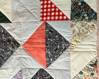 Q19 - $50. Like New Quilt. Measures 29" x 42.5" (lap / throw size)