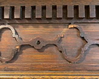 C3 - $1,750. English Renaissance Revival Sideboard. Appraisal dates it to late 19th century. Measures 60" wide x 22.5" deep x 77" tall. Loose fretwork on both sides and missing minor trim pieces. Sturdy and GORGEOUS! Homeowner shipped it back from England in the 90s.