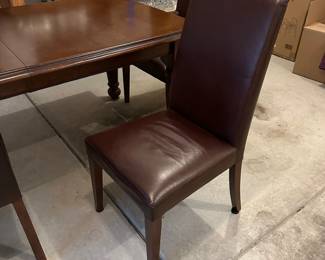 C4 - $1,500. Pottery Barn Table with 8 chairs. Table has 2 leaves. 2 captains chairs. 6 regular chairs. Measures 40" wide x 6' long with NO leaves in. Set includes 2 - 16" leaves. When all together it is 104". Table surface has some gentle wear marks but no huge gouges or issues. Chairs are all in very good condition. Most were scattered around the house in guest bedrooms and not regularly used.