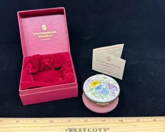 J5 - $50. Crummles & Co Hinged Lidded Trinket Box. Light pink base with floral pattern. Tiny chip in the enamel on the base.