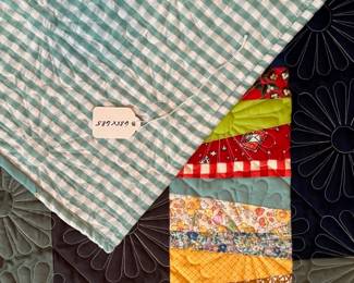 Q13 - $125. Like New Quilt. Measures 63.5" x 68.5" (throw / lap size)