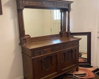 C3 - $1,750. English Renaissance Revival Sideboard. Appraisal dates it to late 19th century. Measures 60" wide x 22.5" deep x 77" tall. Loose fretwork on both sides and missing minor trim pieces. Sturdy and GORGEOUS! Homeowner shipped it back from England in the 90s.