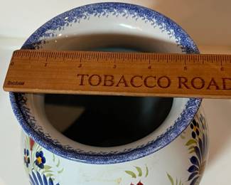 C15 - $50. Quimper Vase Breton Man on one side - floral design on the other. Signed "Henriot Quimper France D 201 F 637 P." Measures 5.75" x 8.5".