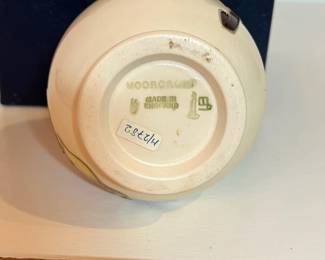 C8 - $100. Ivory Moorcroft Pottery Centenary Pink Magnolia Pattern Vase. Measures 3.5" tall.