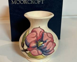 C8 - $100. Ivory Moorcroft Pottery Centenary Pink Magnolia Pattern Vase. Measures 3.5" tall.