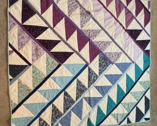 Q10 - $100. Like New Quilt. Measures 65" x 60" (lap size)