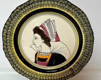 C33 - $40. Hen Riot Quimper "Portrait Plate". Measures 9 7/8"