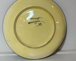 C32 - $30. Single Quimper Plate. Measures 9 1/8". Has 1 small chip on the back and crazing on entire plate.