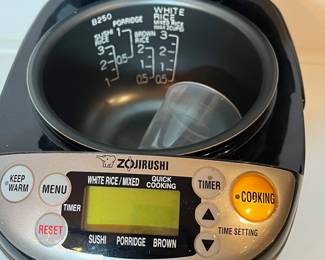 C51 - $60. Zojirushi 3 Cup Rice Cooker. Model NS-LAC05.