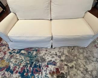 C55 - $1,200. Crate & Barrel Slip Covered Sofa. Measures 78.5" wide x 17.5" floor to seat x 30" deep. (Slipcover was just washed so excuse the wrinkles!) Includes an extra set of slip covers. Very comfortable and in very good condition. Non smoking home - No pets.