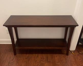 C127 - $65. Sofa Table. Measures 48" x 16" deep x 30" tall.