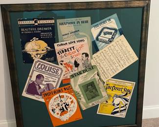 C95 - $40. Framed Sheet Music Covers. Measures 39" x 40" framed.