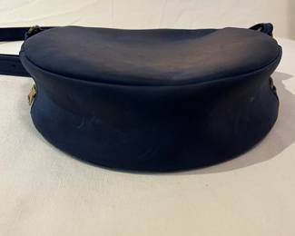 C69 - $50. Portland Leather Goods - Deep Water Blue Crossbody Purse. Measures 9" round + Strap.
