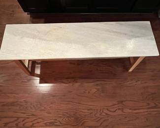 C104 - $45. Target "Accent Table". Measures 46" wide x 12" deep x 18.5" tall. Marble / Stone top with wood frame. Would be great for plants!