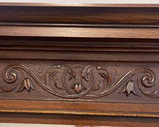 C3 - $1,750. English Renaissance Revival Sideboard. Appraisal dates it to late 19th century. Measures 60" wide x 22.5" deep x 77" tall. Loose fretwork on both sides and missing minor trim pieces. Sturdy and GORGEOUS! Homeowner shipped it back from England in the 90s.