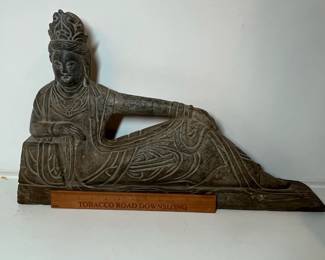 C129 - $125. Reclining Buddha - heavy stone. 23" long x 14" tall.