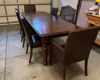 C4 - $1,500. Pottery Barn Table with 8 chairs. Table has 2 leaves. 2 captains chairs. 6 regular chairs. Measures 40" wide x 6' long with NO leaves in. Set includes 2 - 16" leaves. When all together it is 104". Table surface has some gentle wear marks but no huge gouges or issues. Chairs are all in very good condition. Most were scattered around the house in guest bedrooms and not regularly used.