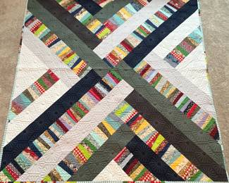 Q13 - $125. Like New Quilt. Measures 63.5" x 68.5" (throw / lap size)