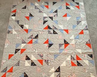 Q14 - $100. Like New Quilt. Measures 62.5" x 70.5" (throw/lap size)
