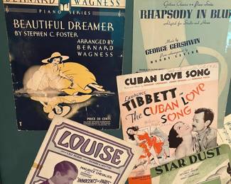 C95 - $40. Framed Sheet Music Covers. Measures 39" x 40" framed.