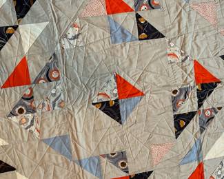 Q14 - $100. Like New Quilt. Measures 62.5" x 70.5" (throw/lap size)