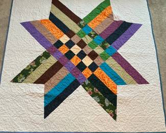 Q11 - $100. Like New Quilt. Measures 63.5" x 63.5" (throw / lap size)